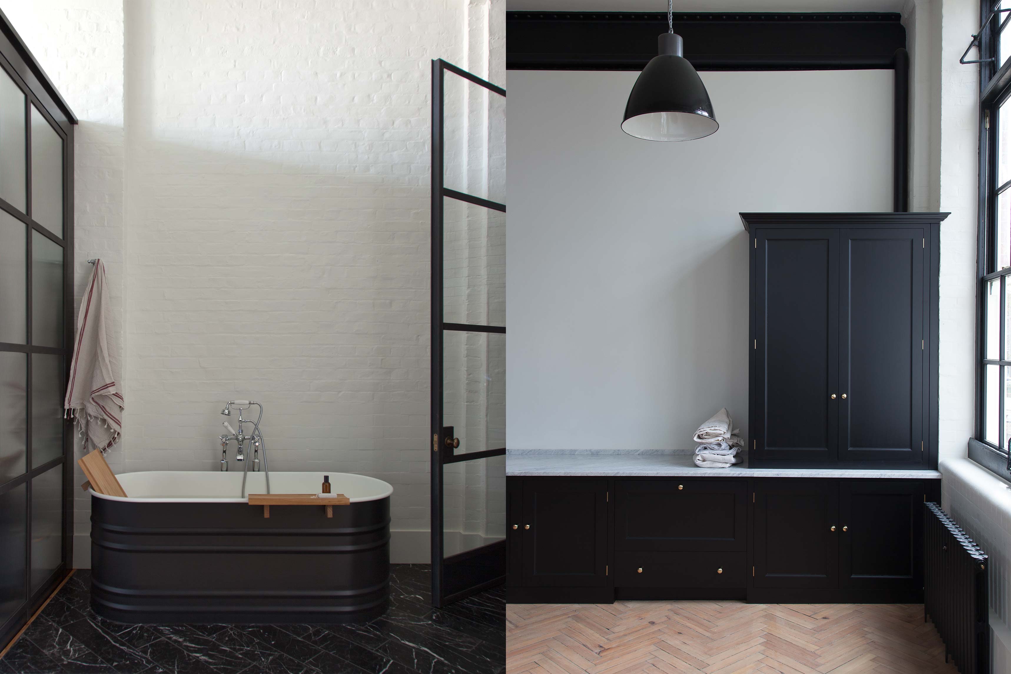  Dual view of a sleek bathroom with a black freestanding tub, a utility room featuring black cabinetry, marble countertops, and industrial lighting