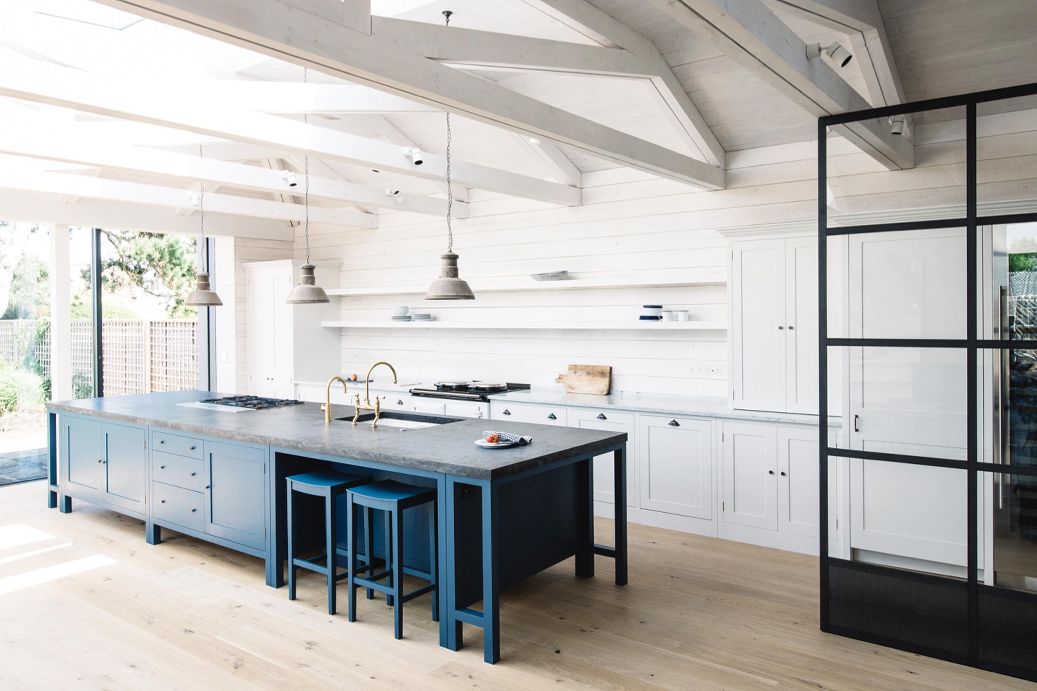  Kitchen with Belgian Blue Fossil Stone worktop and whitewashed walls