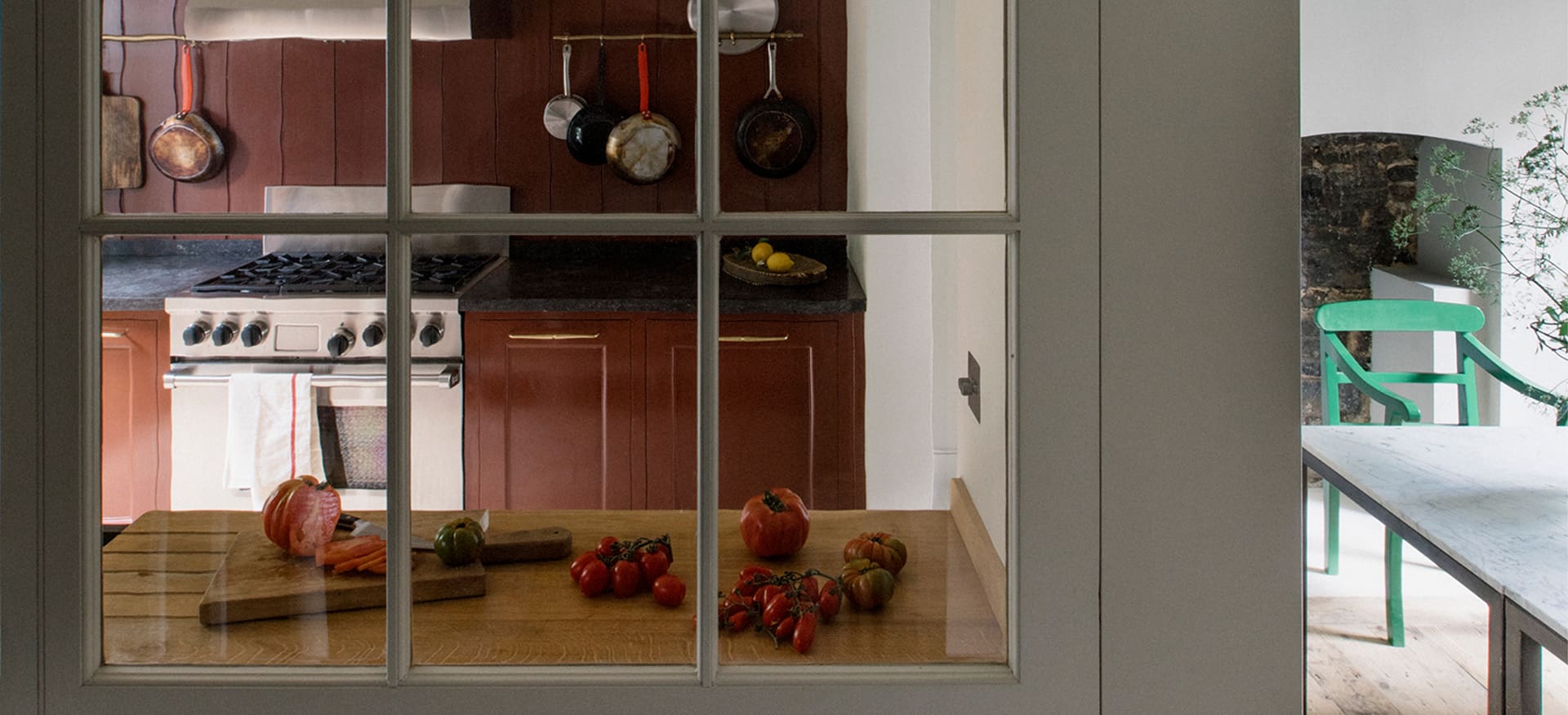  Window view of vegetables being cut on Oak countertops