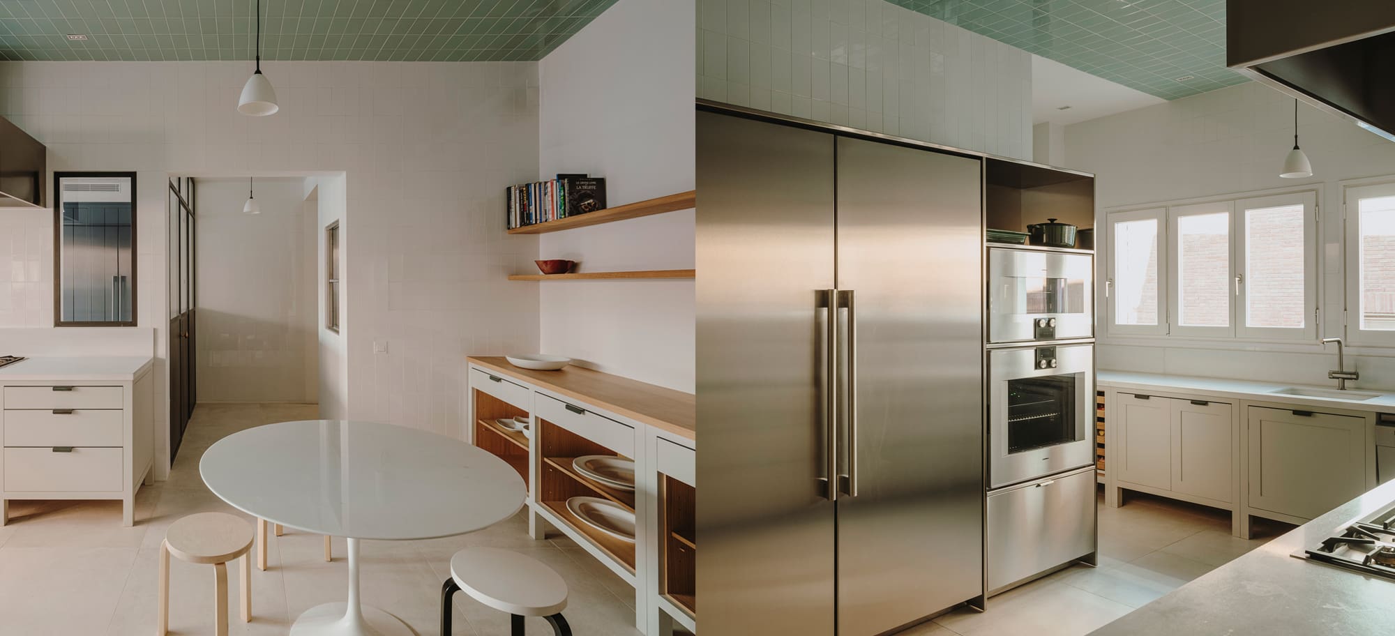  Dual view of kitchen with breakfast nook featuring open oak shelving and stools, with a sleek cooking area.