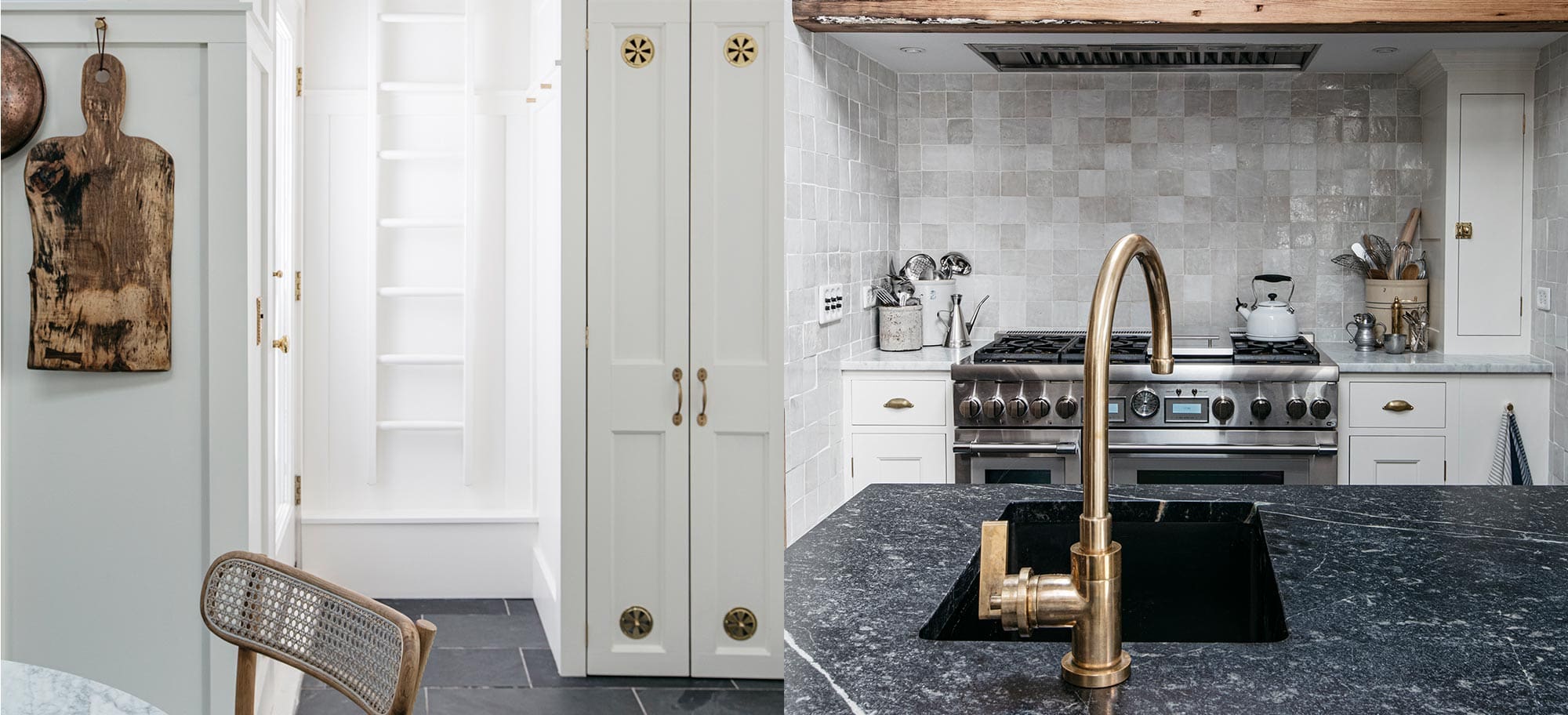  Close-up of a white porcelain farmhouse sink in a Provincetown kitchen by Plain English, surrounded by marble countertops and custom cabinetry in a muted green finish.
